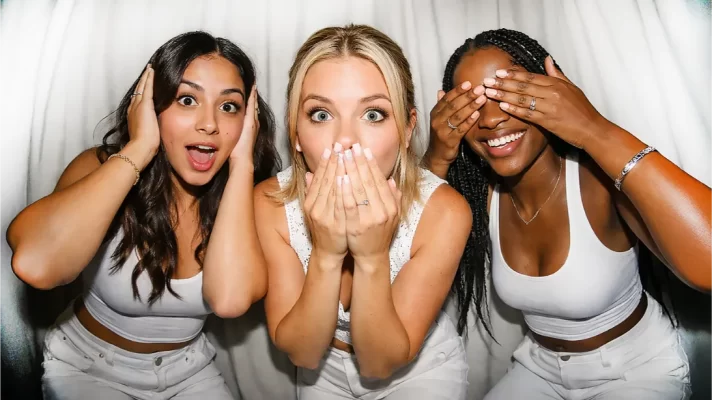 7 fun photo booth poses plus 100 more printable ideas! Perfect for weddings, parties, and viral photo moments. Get your pose guide today!